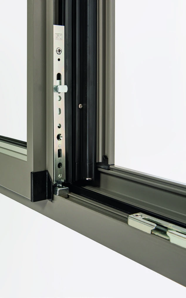 Verrou à coulisse du vantail secondaire d’une menuiserie aluminium